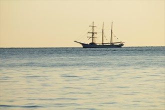 Tall ship sailing on ocean