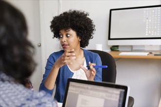 Woman in discussion in Small Business