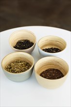 Selection of loose leaf teas in bowls