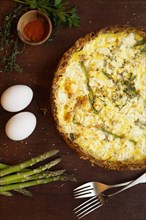 Quiche with ingredients of eggs