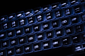 Close-up od blurred black computer keyboard