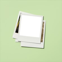 Stack of instant pictures with blank on top