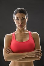 Studio portrait of woman in sports bra