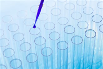 Blue liquid in pipette and test tubes