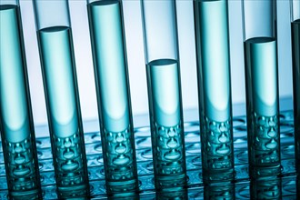 Close-up of test tubes with blue liquid