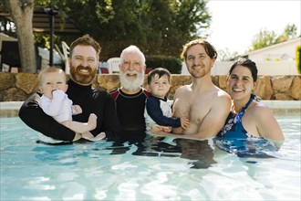 Portrait of family with boys (12-17 months