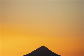Sunset sky over peak in Cerrillos Hills State Park