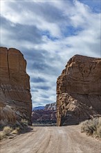 Dirt road between sandstone cliffs in Grand Staircase-Escalante National Monument