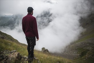 Man hiking in Swiss Alps