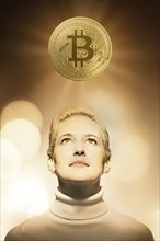 Woman with bitcoin over head