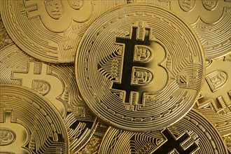 Close-up of golden bitcoins