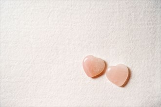 Glass hearts on white background