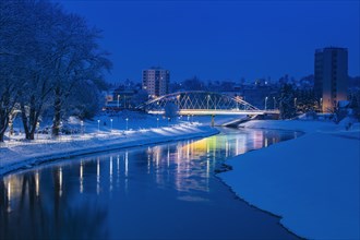 Poland, Subcarpathia, Rzeszow, Illuminated bridge at night in winter