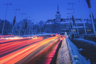 Poland, Subcarpathia, Rzeszow, Evening traffic near castle in winter