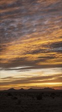 Usa, New Mexico, El Dorado, Santa Fe, Sunset sky over desert landscape