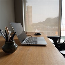 Open laptop on business desk