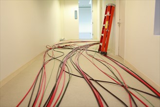 Electrical wires in hallway in new building