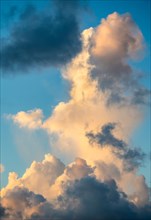 Cumulonimbus clouds on sky at sunset