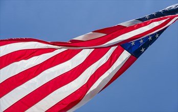 Low angle view of American flag