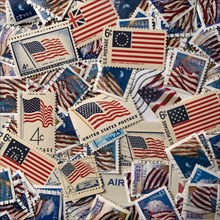 Assorted American flag postage stamps