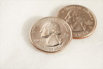 Studio shot of US Dollar quarter coins