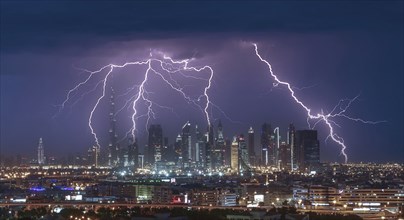 Thunderstorm over modern city