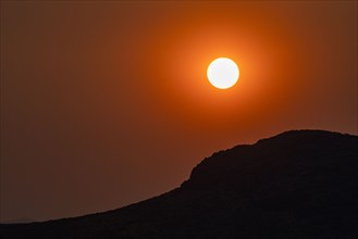 Silhouette of mountain at sunset