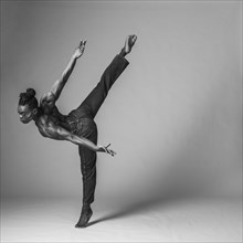 Studio shot of man dancing