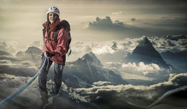 Caucasian hiker climbing mountain