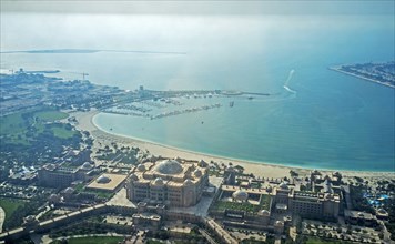 Aerial view of Abu Dhabi cityscape and coastline