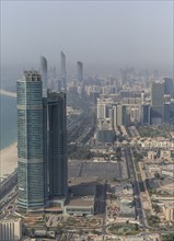 Aerial view of high rise buildings in Abu Dhabi cityscape