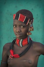 Black girl wearing traditional jewelry