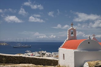 Church overlooking cityscape and ocean