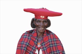 Black woman wearing traditional hat and cape