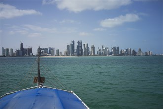 Boat sailing towards Doha harbor