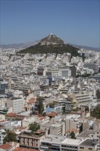 Aerial view of Athens cityscape and mountain