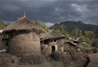 Village huts on remote hillside