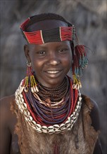 Black girl wearing traditional jewelry