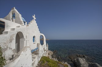 Traditional church on rocky oceanfront