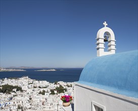 Traditional church and Mykonos cityscape