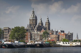 Ornate building over Amsterdam canal