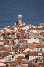 Aerial view of rooftops in Piran cityscape