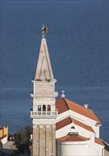 Aerial view of tower in Piran cityscape