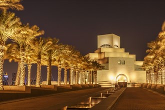 Doha Museum of Islamic Art illuminated at night