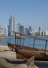 Wooden boats at urban waterfront
