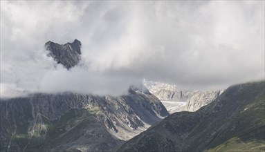 Clouds in remote mountain landscape