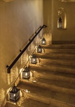 Lanterns illuminating staircase