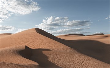 Shadows on sand dunes in desert