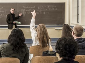 Teacher talking to students in classroom