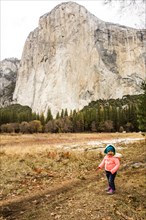 Caucasian baby girl walking in Yosemite National Park